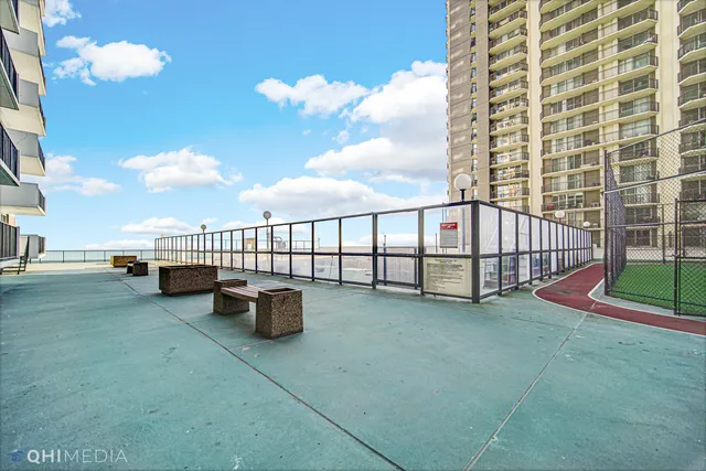 a view of a balcony with ocean view
