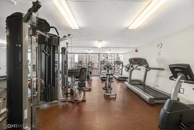 a living room with furniture window and wooden floor
