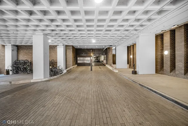 a view of a patio with table and chairs
