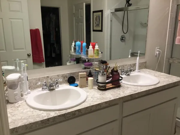 a bathroom with a sink and a mirror