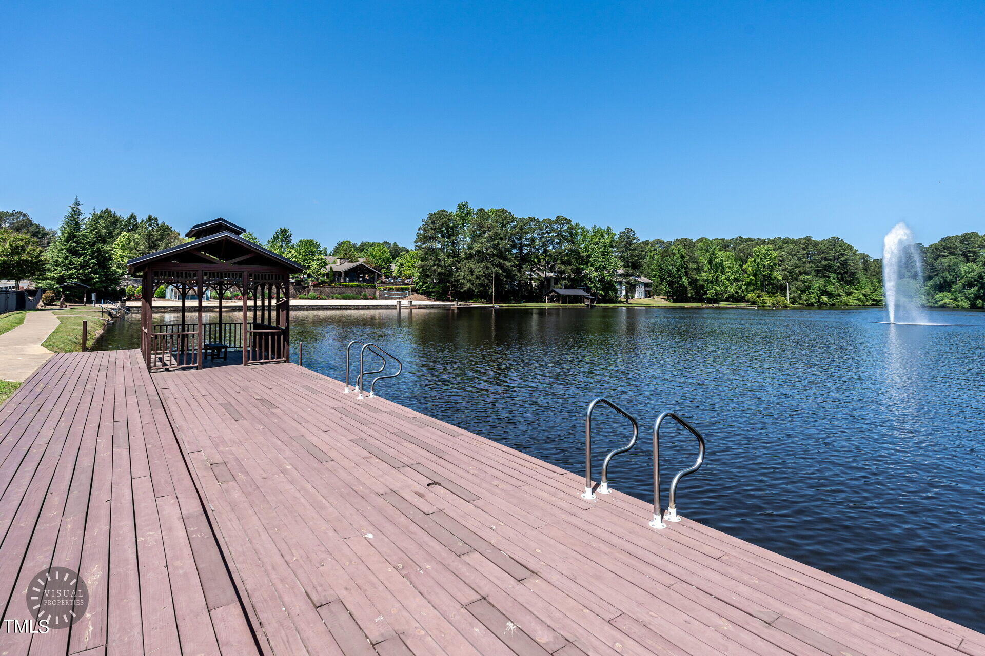 1233 Silver Beach Way Raleigh, NC 27606 - Photo 25 of 26 a view of a lake with wooden floor