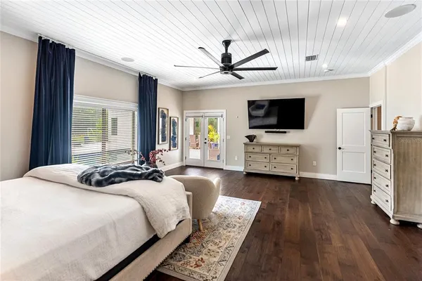 a bedroom with a bed and furniture