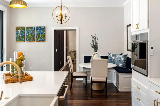 a living room with furniture window and wooden floor