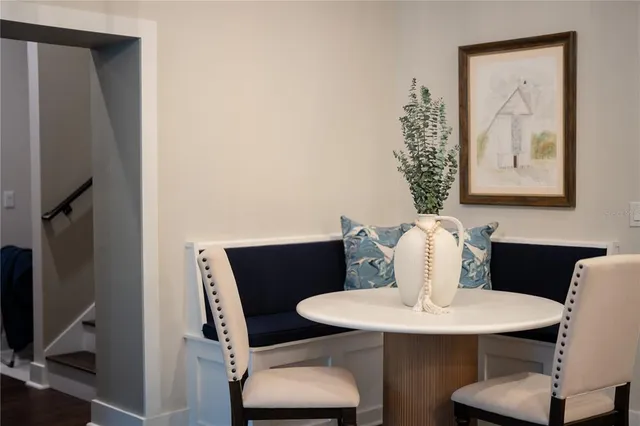 a kitchen with stainless steel appliances a sink a stove and a refrigerator