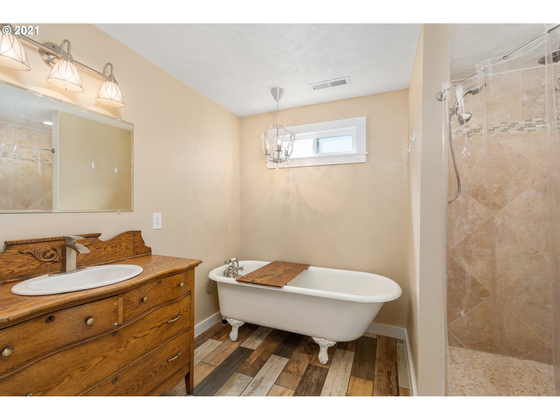 69021 Nicolai Road Rainier, OR 97048 - Photo 14 of 32 a bathroom with a sink and a mirror