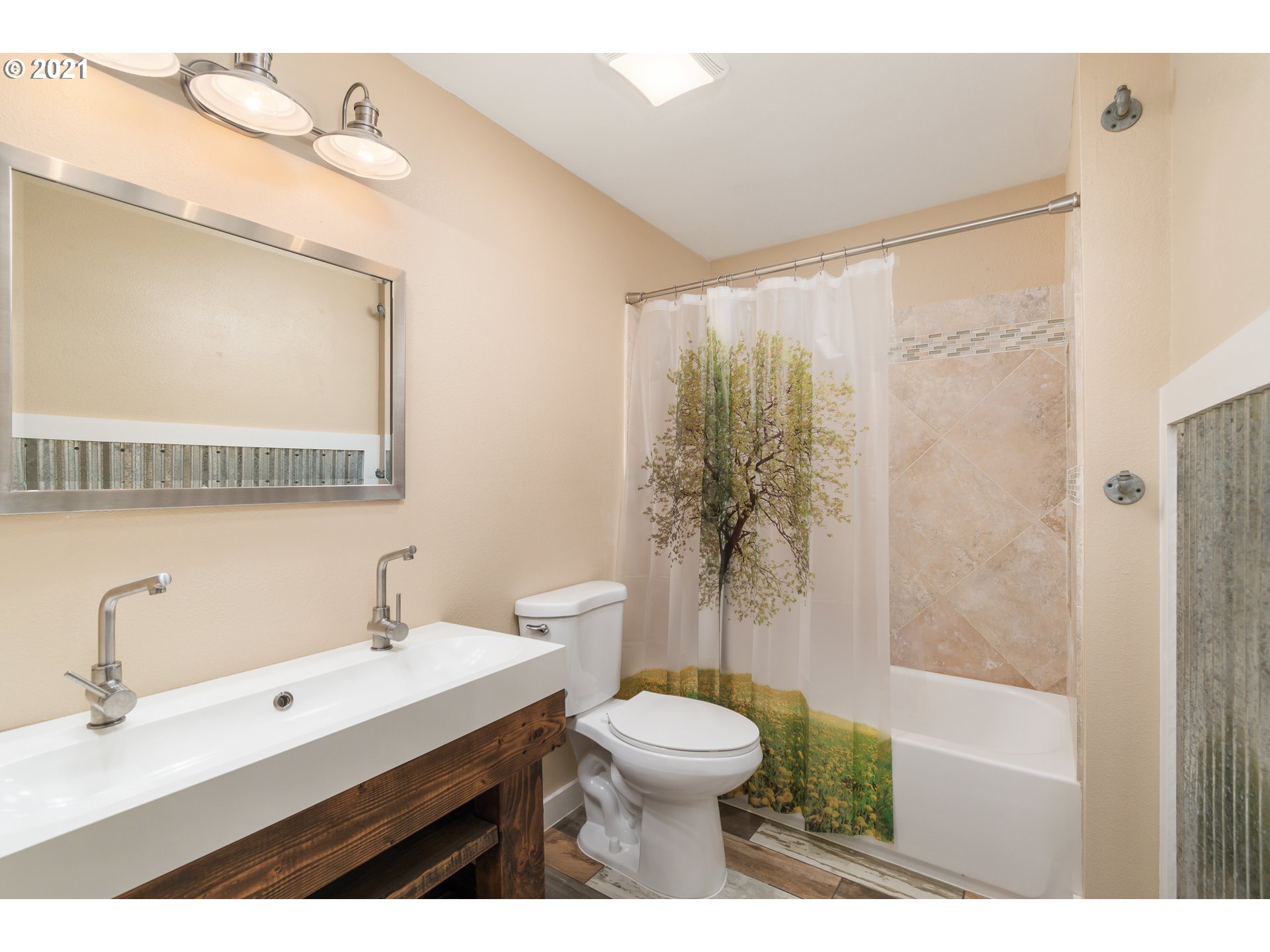 69021 Nicolai Road Rainier, OR 97048 - Photo 16 of 32 a bathroom with a sink a toilet and shower
