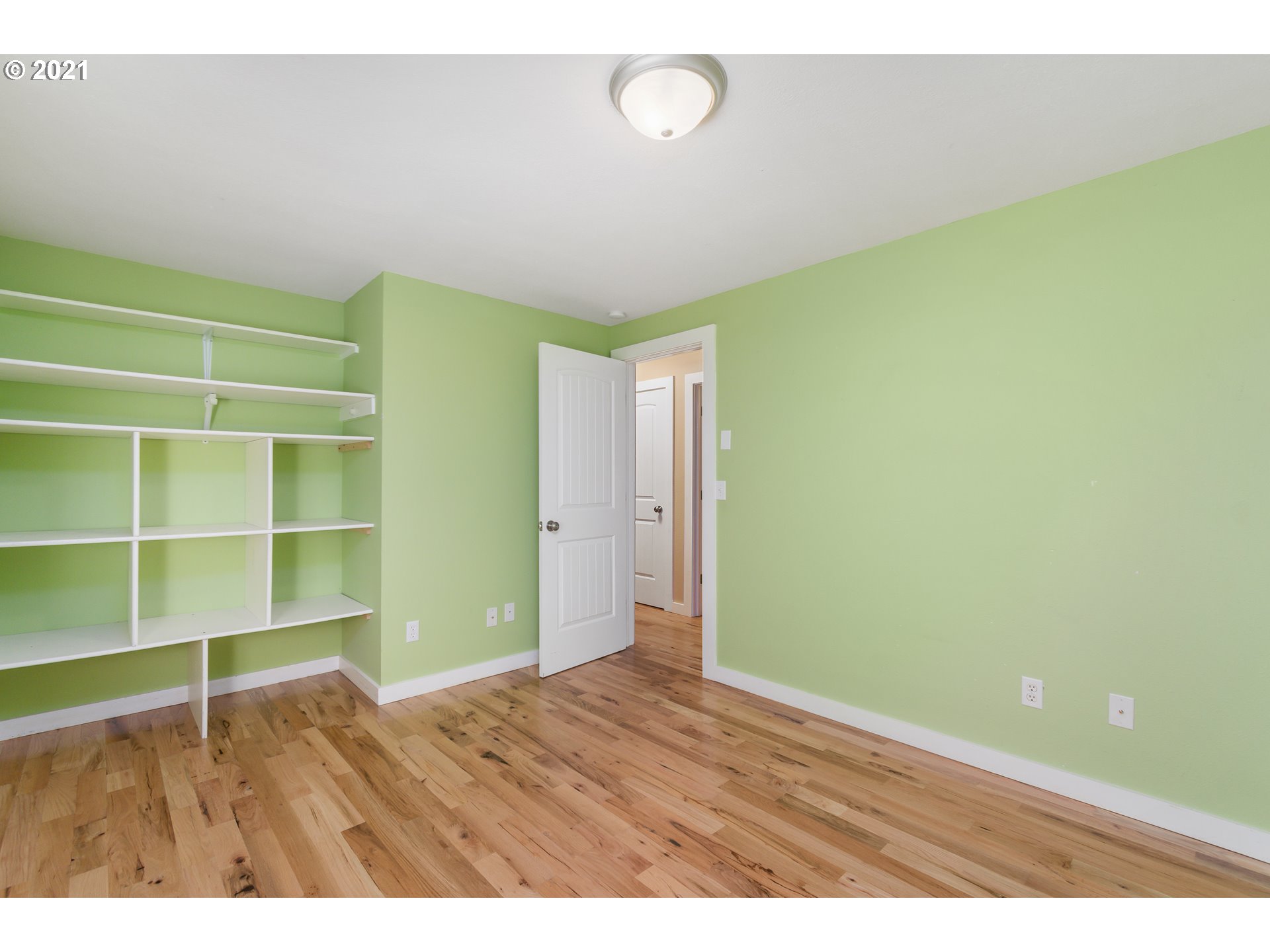 69021 Nicolai Road Rainier, OR 97048 - Photo 17 of 32 a view of an empty room with empty room and wooden floor