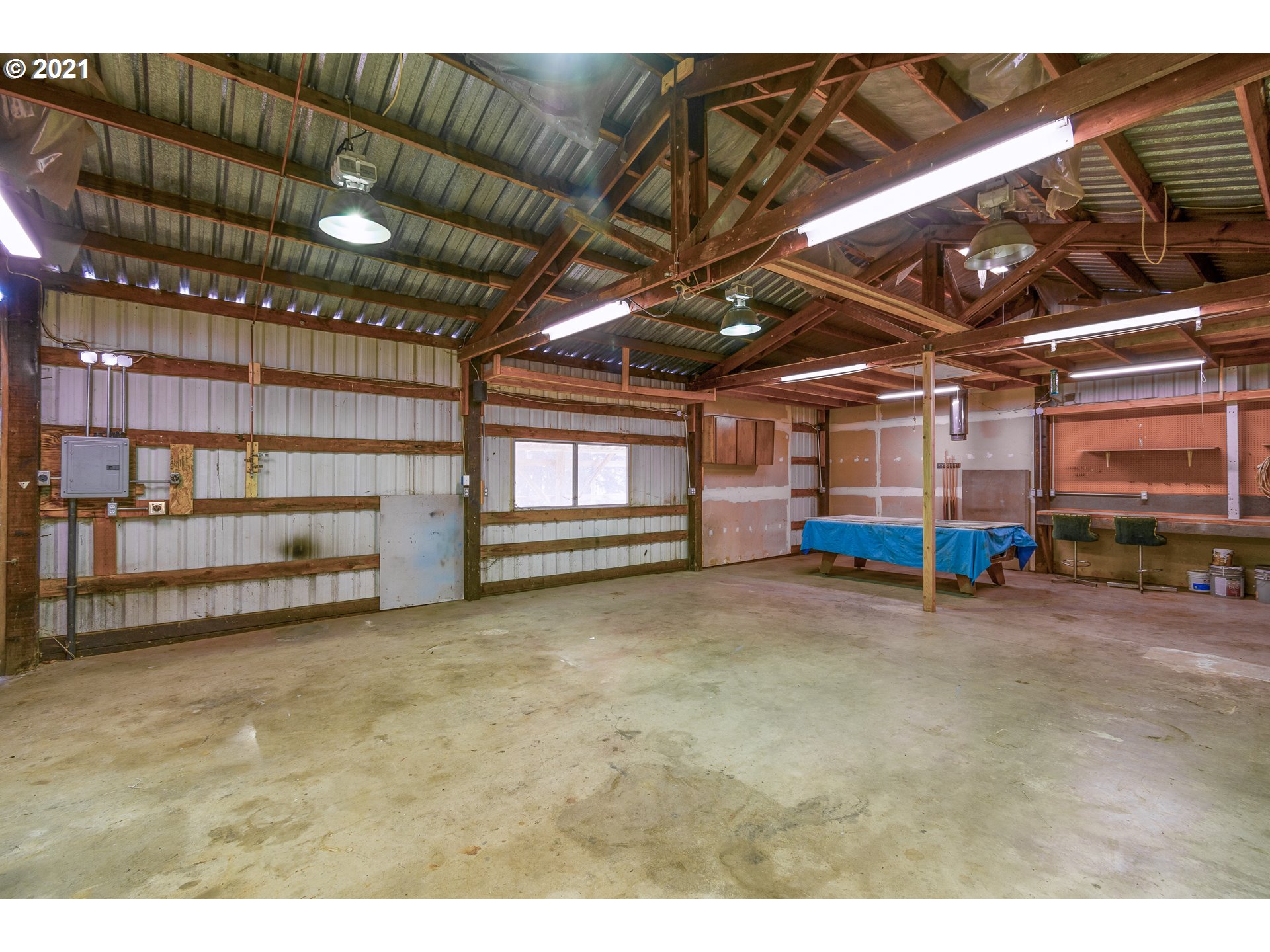 69021 Nicolai Road Rainier, OR 97048 - Photo 22 of 32 a view of an empty room with a projector