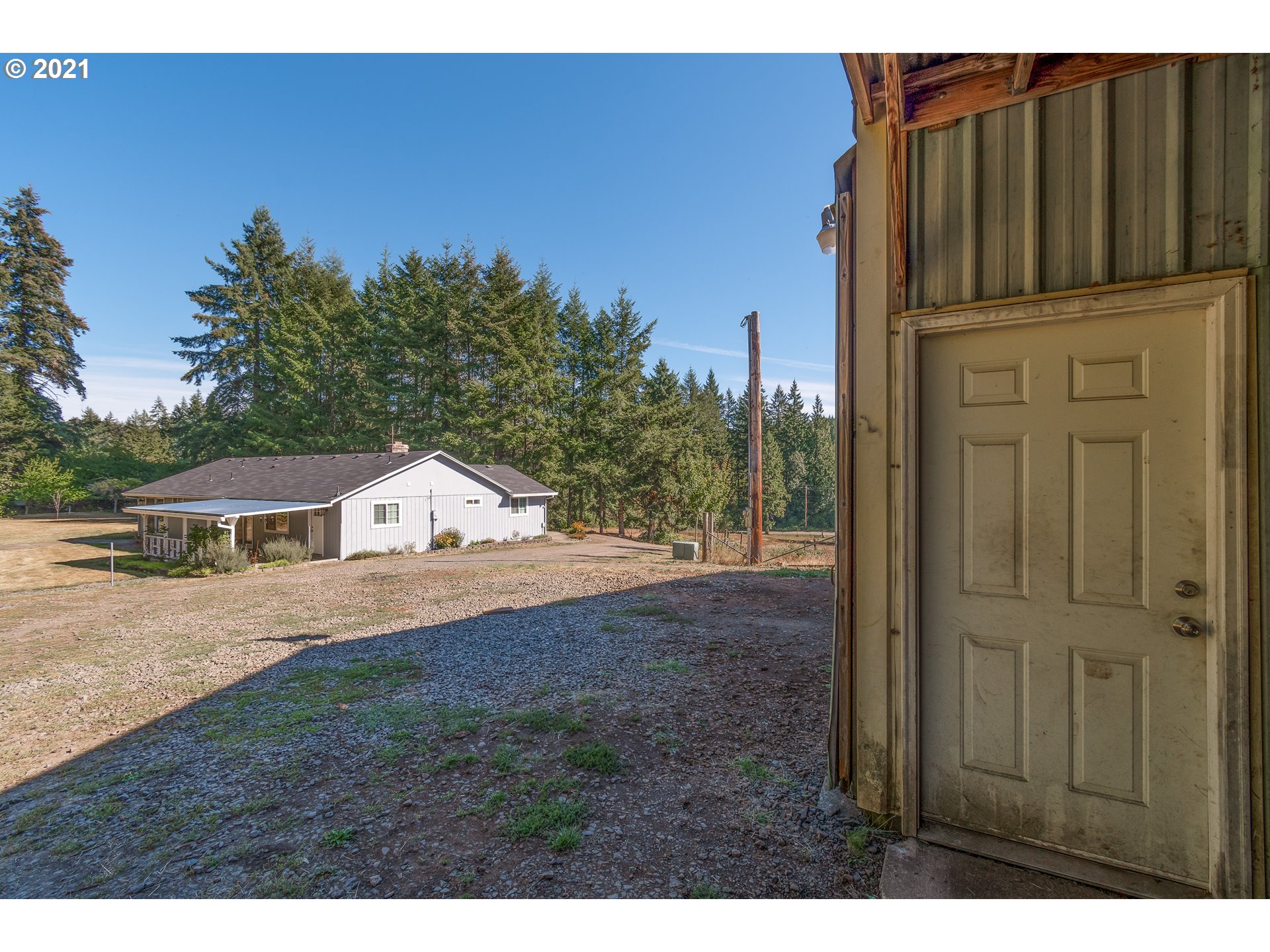 69021 Nicolai Road Rainier, OR 97048 - Photo 24 of 32 a view of a house with a yard