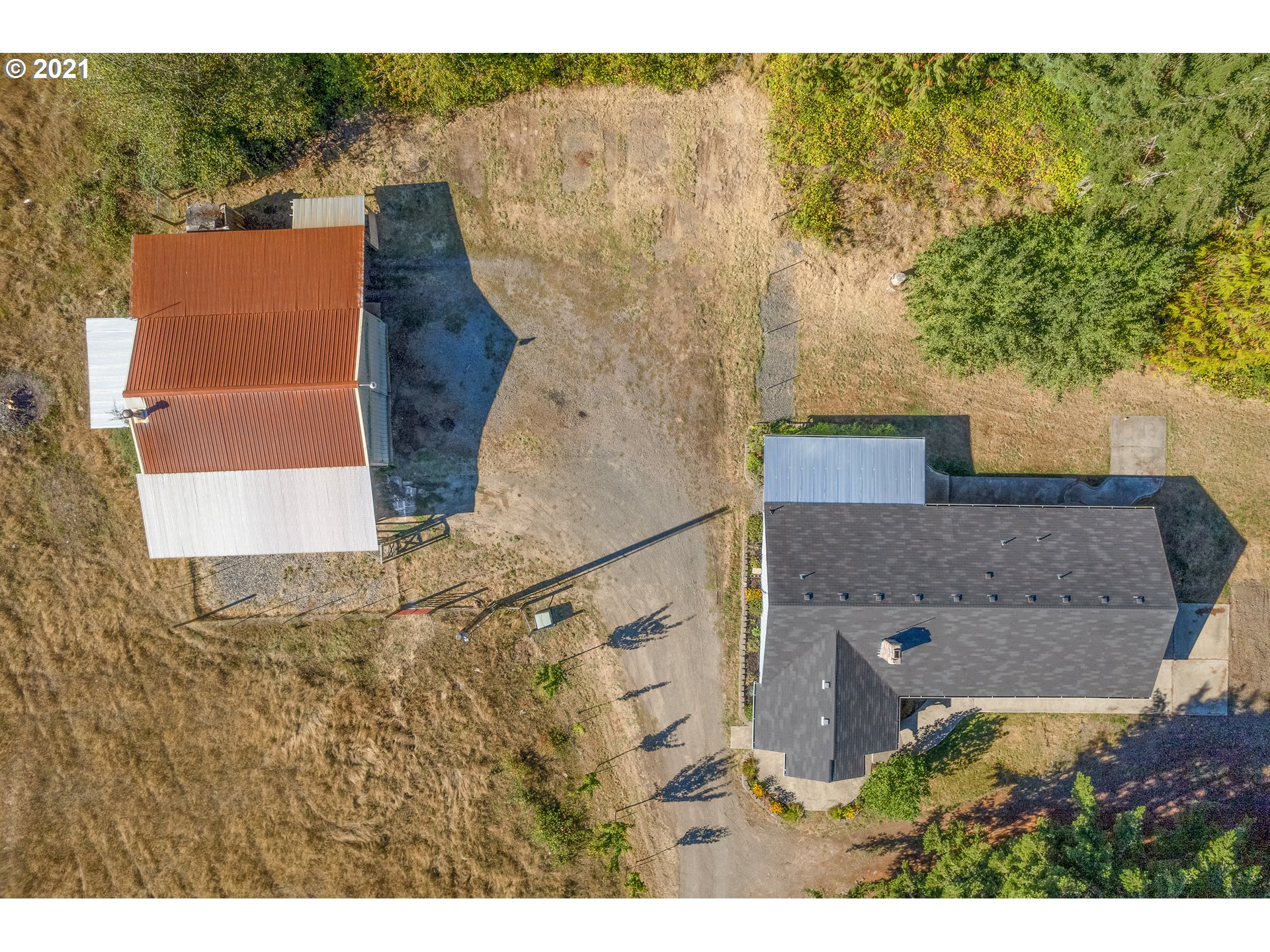 69021 Nicolai Road Rainier, OR 97048 - Photo 25 of 32 a aerial view of a house with a yard and large tree