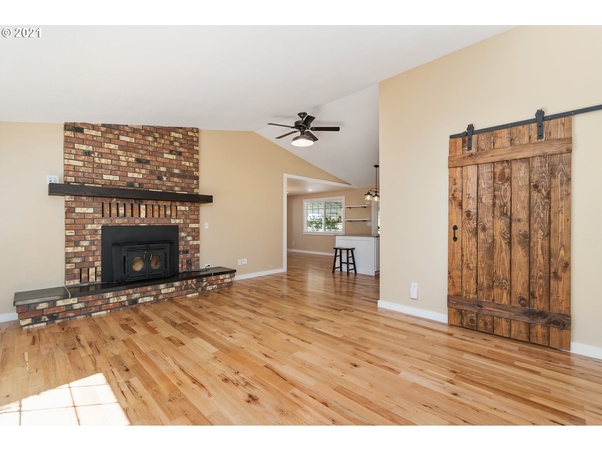 69021 Nicolai Road Rainier, OR 97048 - Photo 4 of 32 a view of an empty room with a fireplace