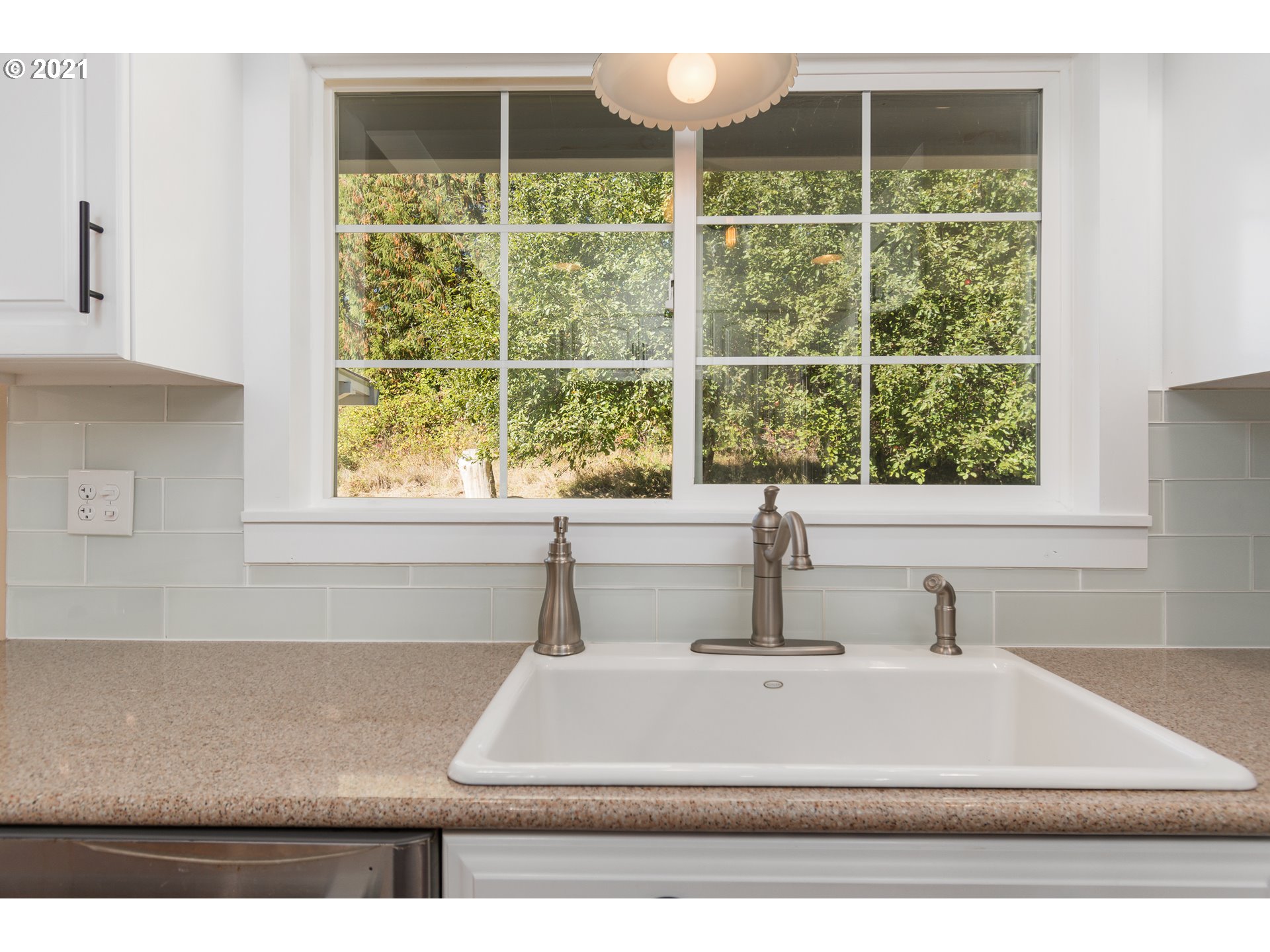 69021 Nicolai Road Rainier, OR 97048 - Photo 8 of 32 a bathroom with a sink and a window