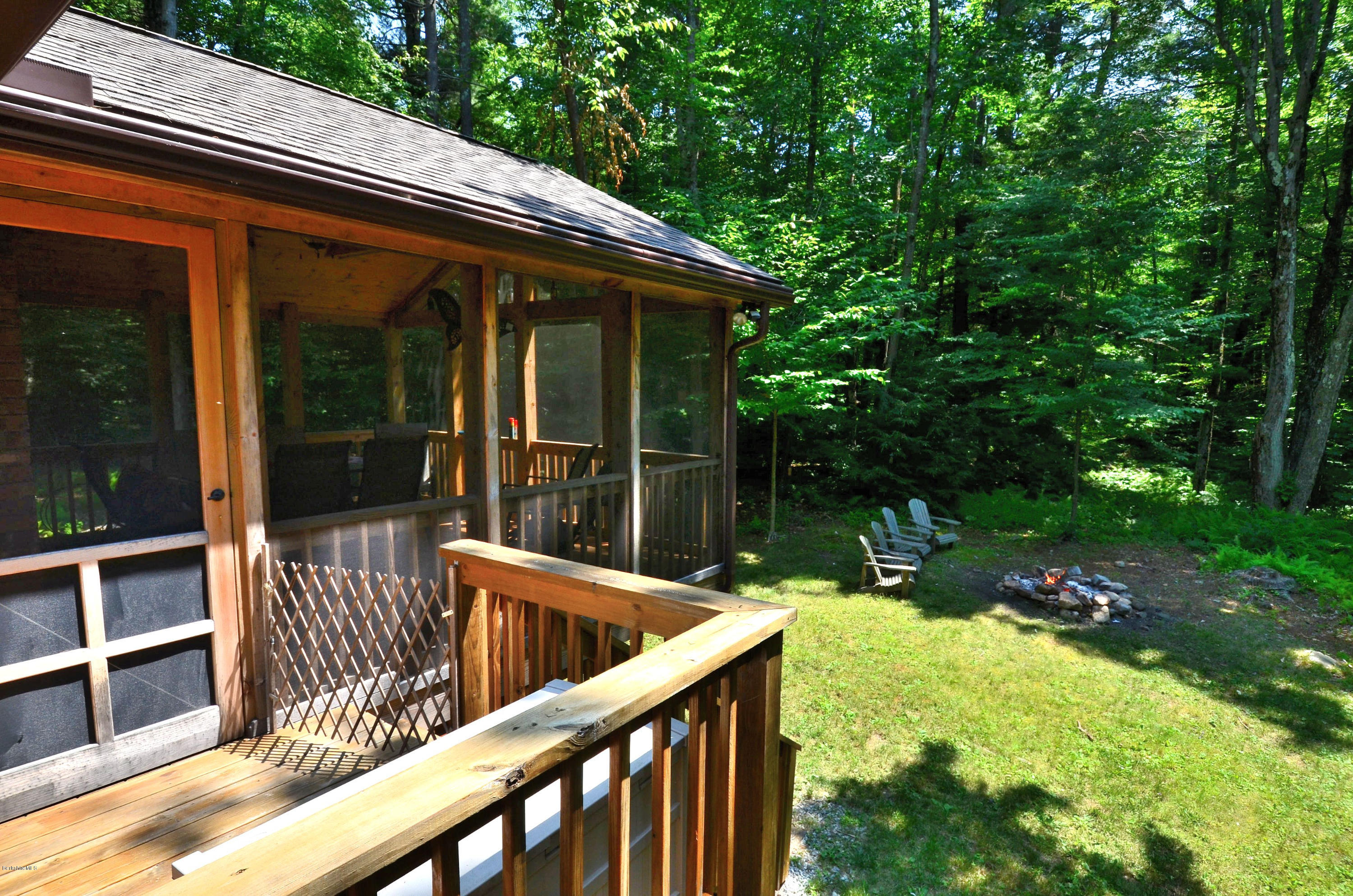 10 Moreau Road Blandford, MA 01008 - Photo 23 of 39 Screen Porch and Fire Pit Side Yard
