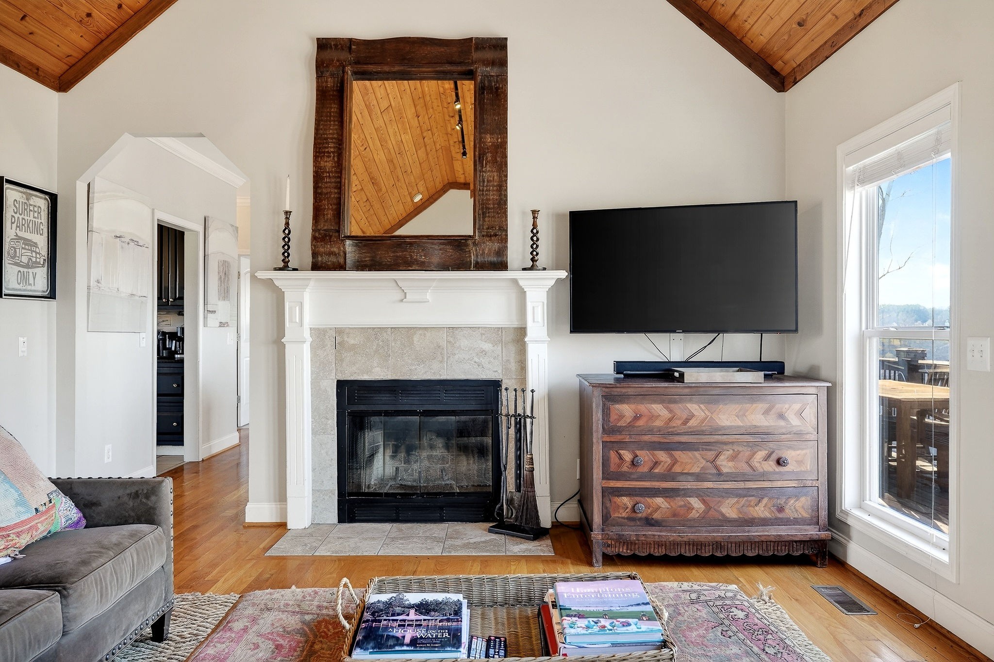 1175 Hutchins Bend Road Sparta, TN 38583 - Photo 12 of 76 a living room with furniture a flat screen tv and a fireplace
