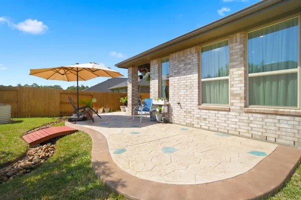 $359,000 | 1409 Northwood Blf Lane, Pinehurst, TX 77362