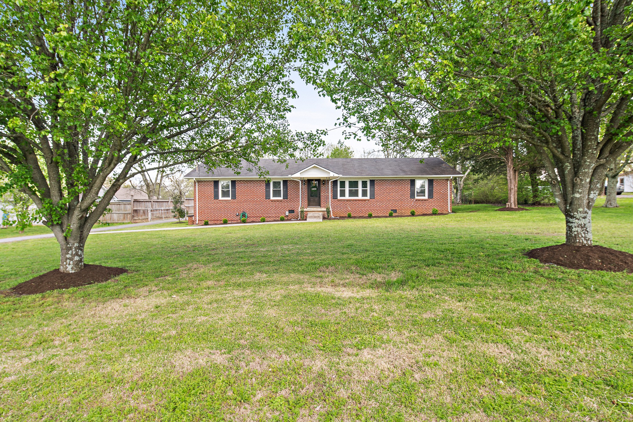 9161 Versailles Road Rockvale, TN 37153 - Photo 1 of 32 a view of house with yard and green space