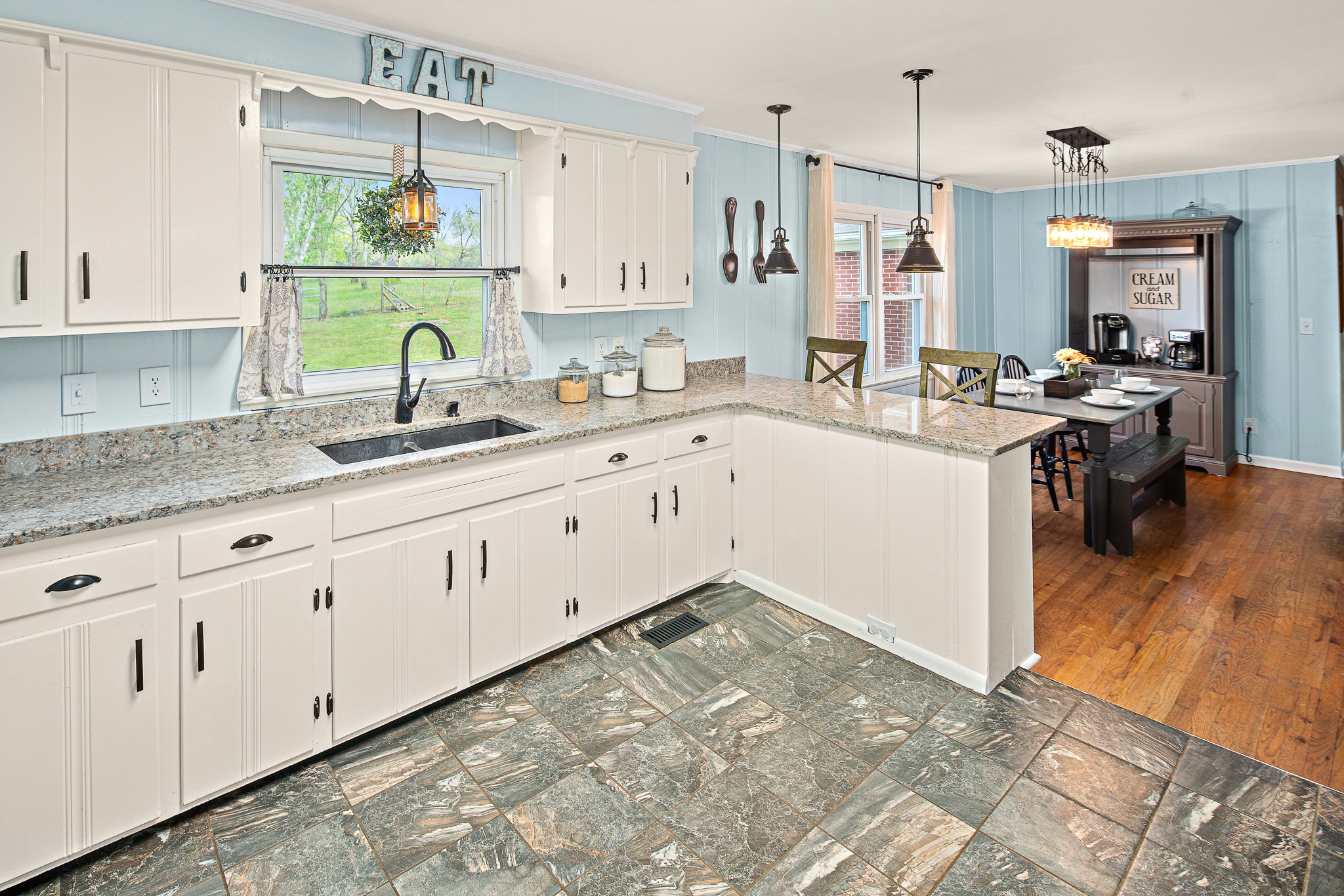 9161 Versailles Road Rockvale, TN 37153 - Photo 11 of 32 a kitchen with sink stove and cabinets