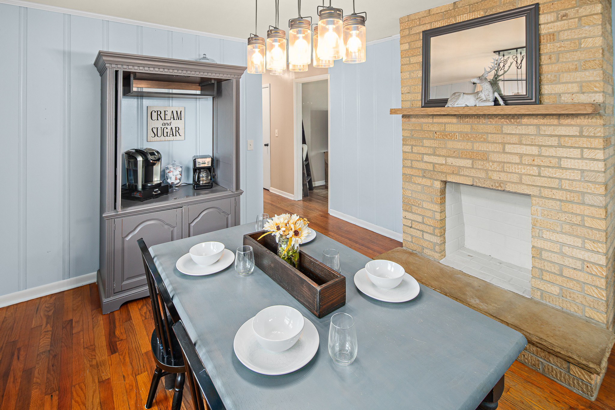 9161 Versailles Road Rockvale, TN 37153 - Photo 15 of 32 a dining room with furniture and a chandelier