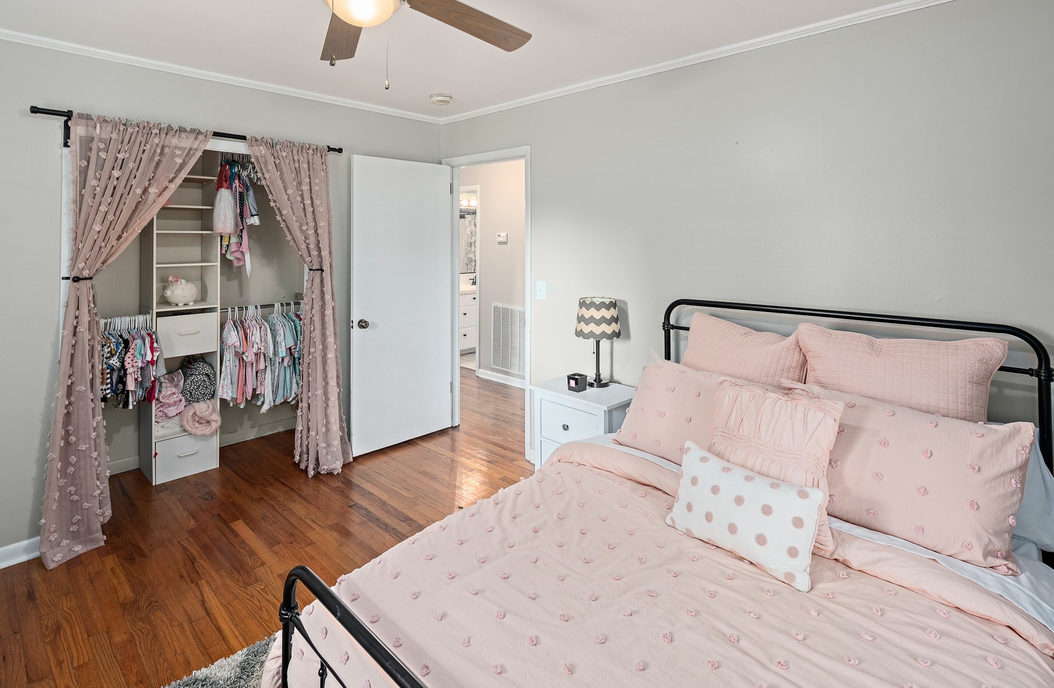 9161 Versailles Road Rockvale, TN 37153 - Photo 22 of 32 a bedroom with a bed and a walk in closet