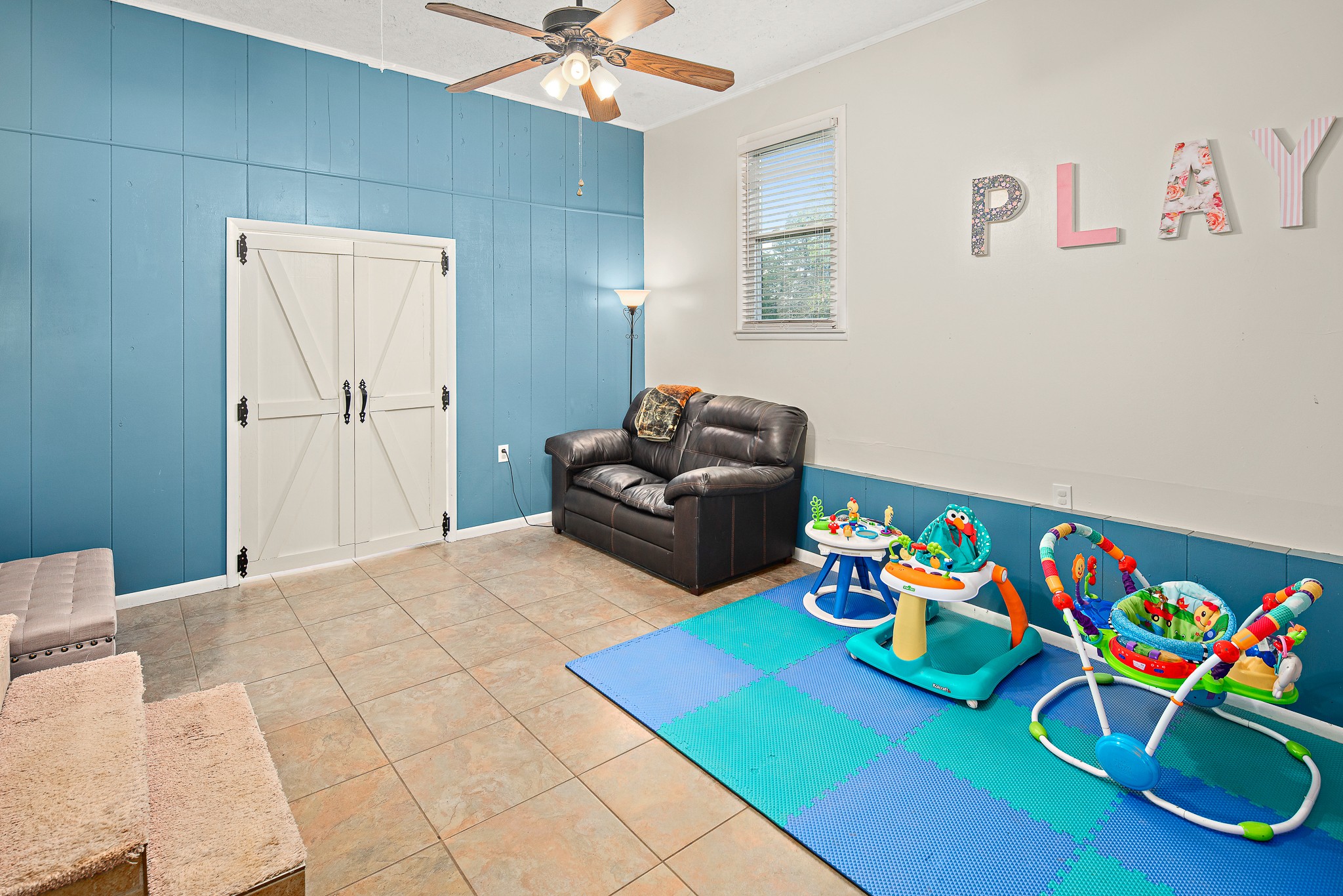 9161 Versailles Road Rockvale, TN 37153 - Photo 25 of 32 a bedroom with toys and a wooden floor