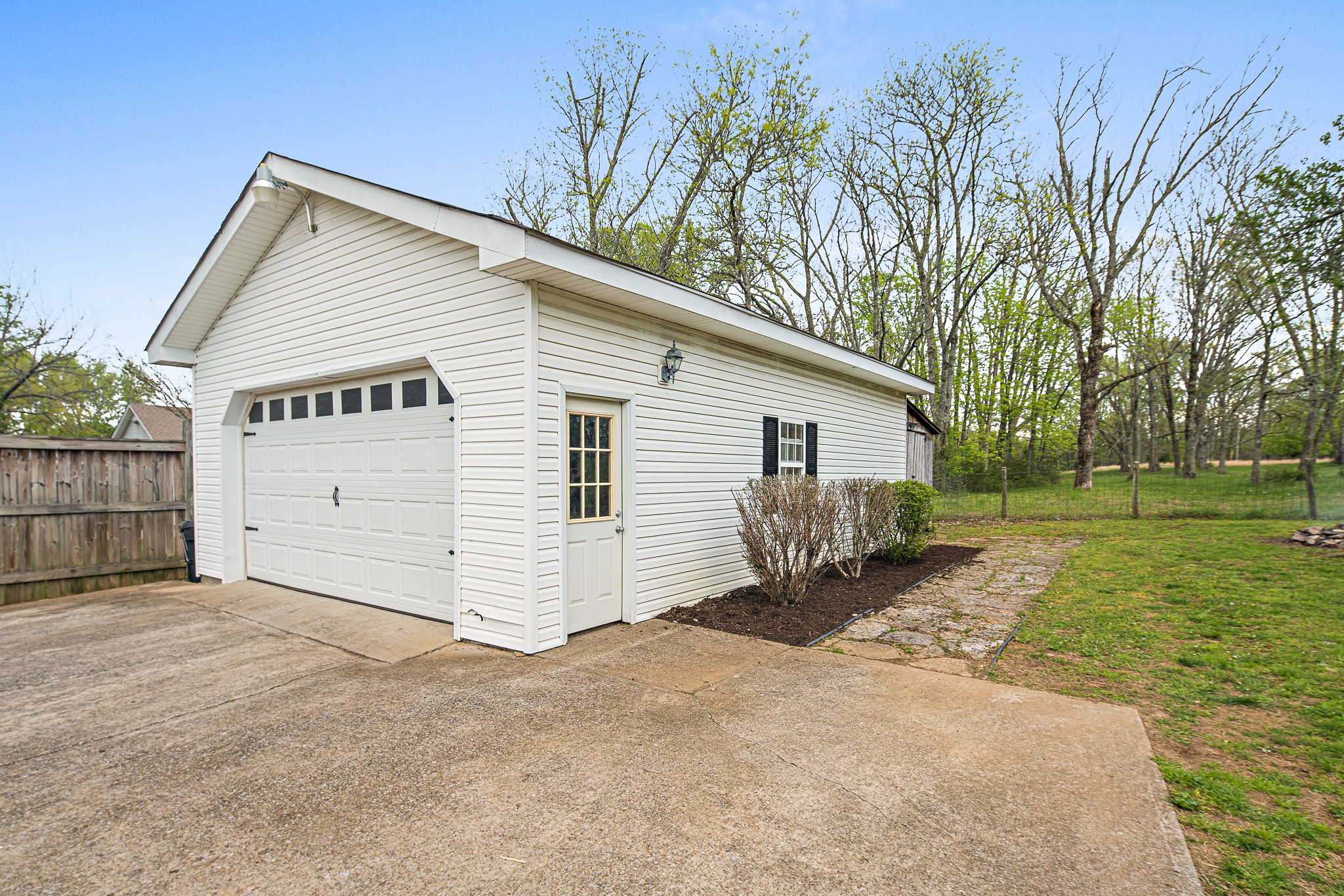 9161 Versailles Road Rockvale, TN 37153 - Photo 31 of 32 a view of a house with a yard