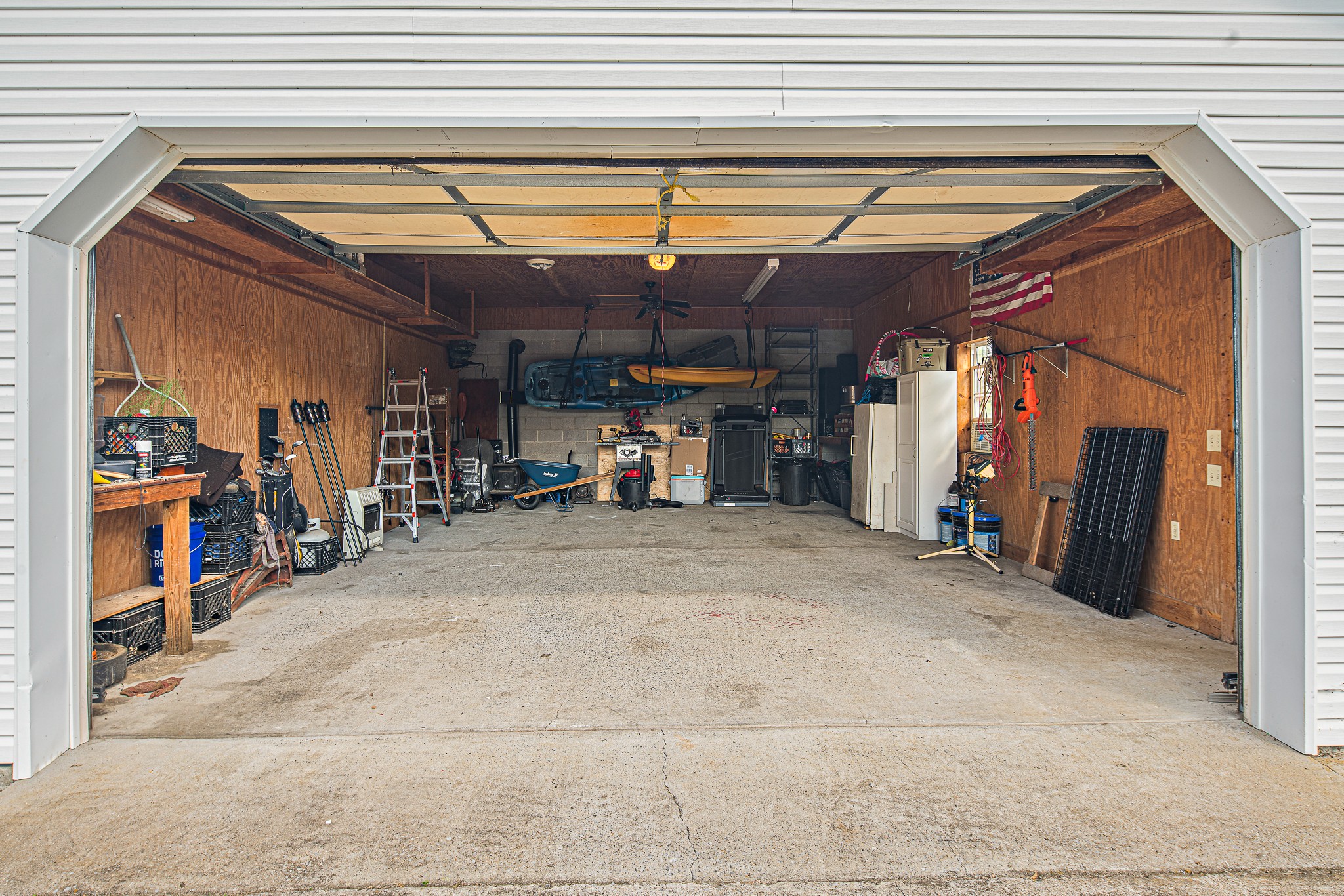 9161 Versailles Road Rockvale, TN 37153 - Photo 32 of 32 a view of a garage with wooden floors