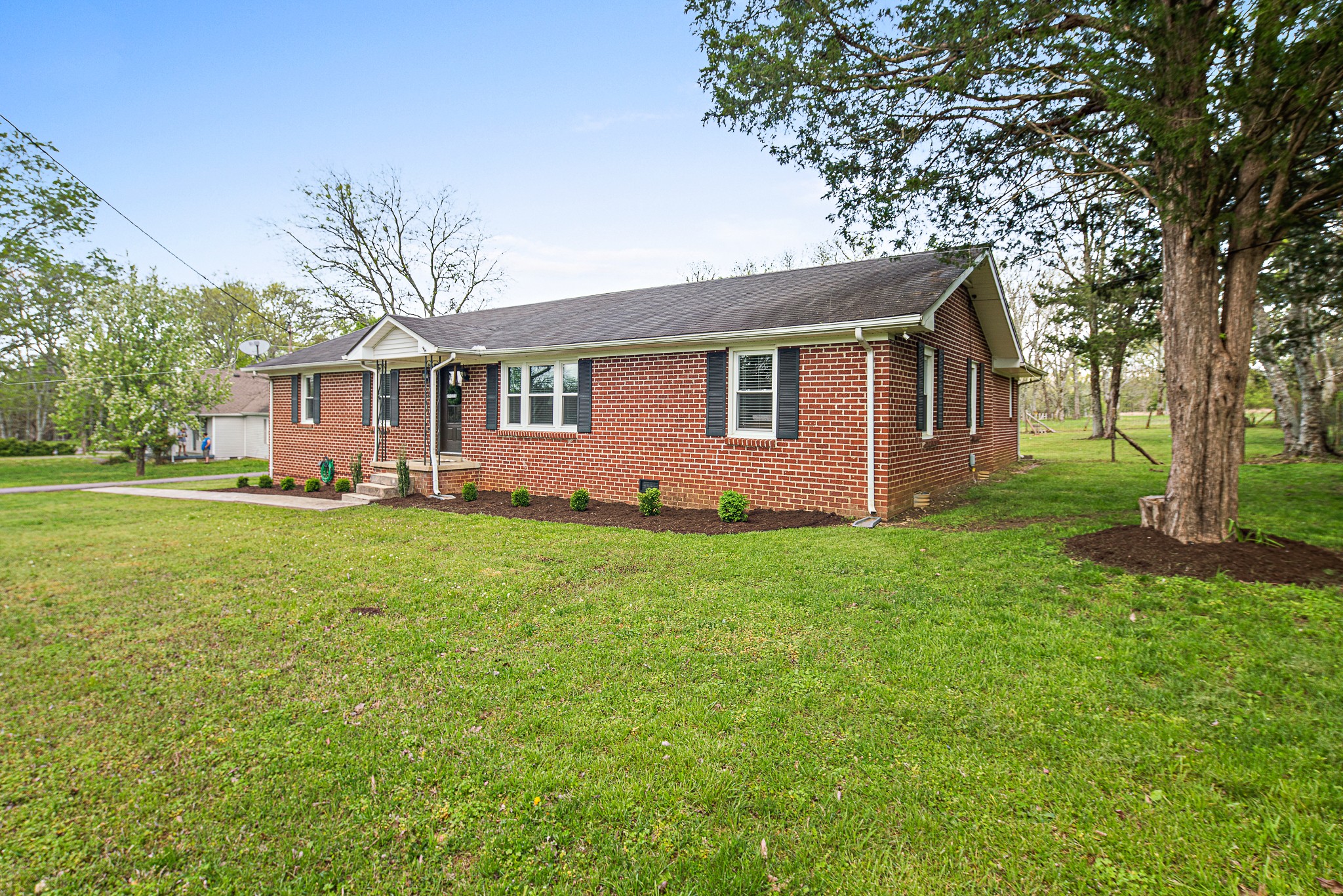 9161 Versailles Road Rockvale, TN 37153 - Photo 4 of 32 a front view of house with yard and green space