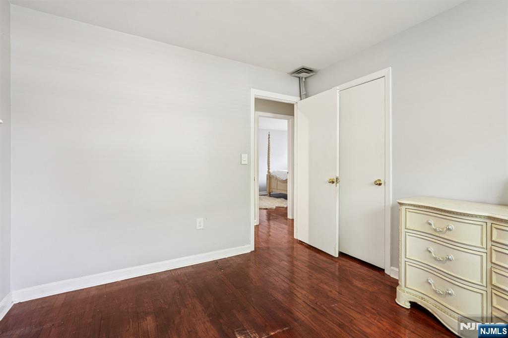 63 Crestmont Road West Orange, NJ 07052 - Photo 20 of 40 a view of an empty room and wooden floor