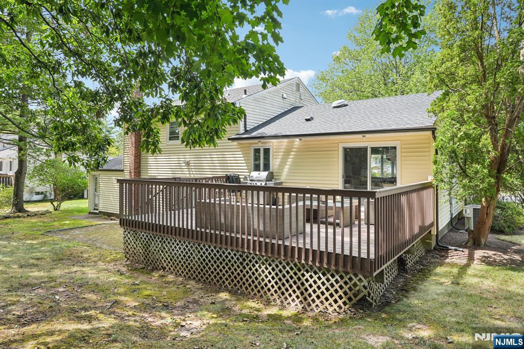 63 Crestmont Road West Orange, NJ 07052 - Photo 35 of 40 a view of a brick house with a small yard