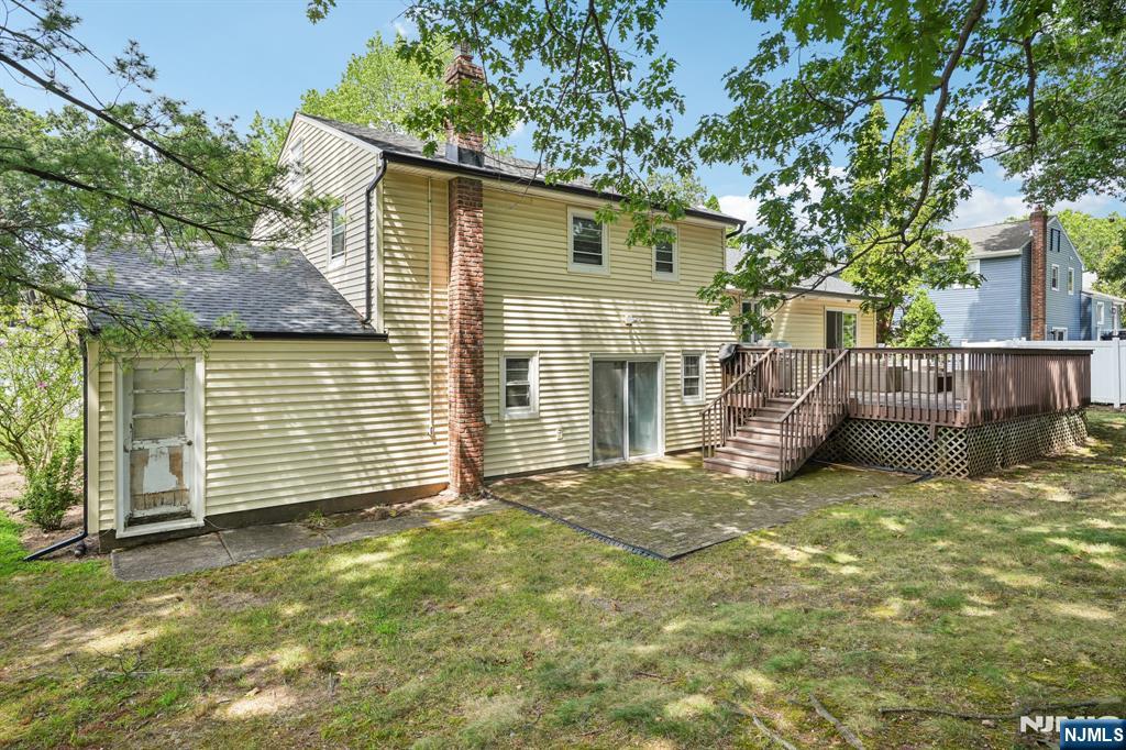 63 Crestmont Road West Orange, NJ 07052 - Photo 36 of 40 a view of a house with a yard and sitting area