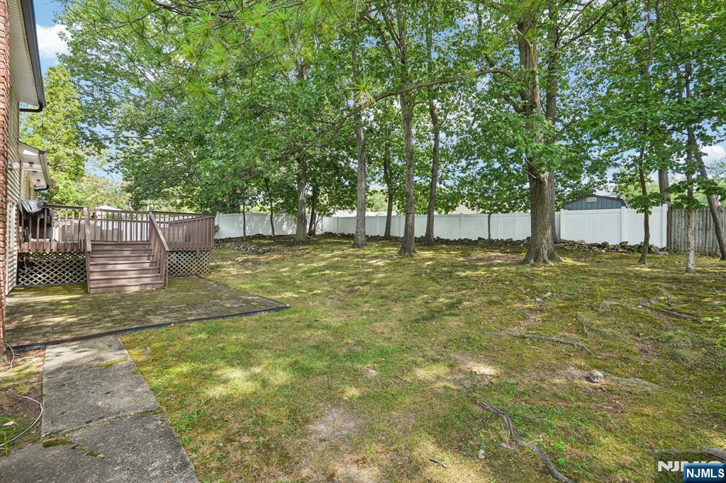63 Crestmont Road West Orange, NJ 07052 - Photo 37 of 40 a view of a yard with trees