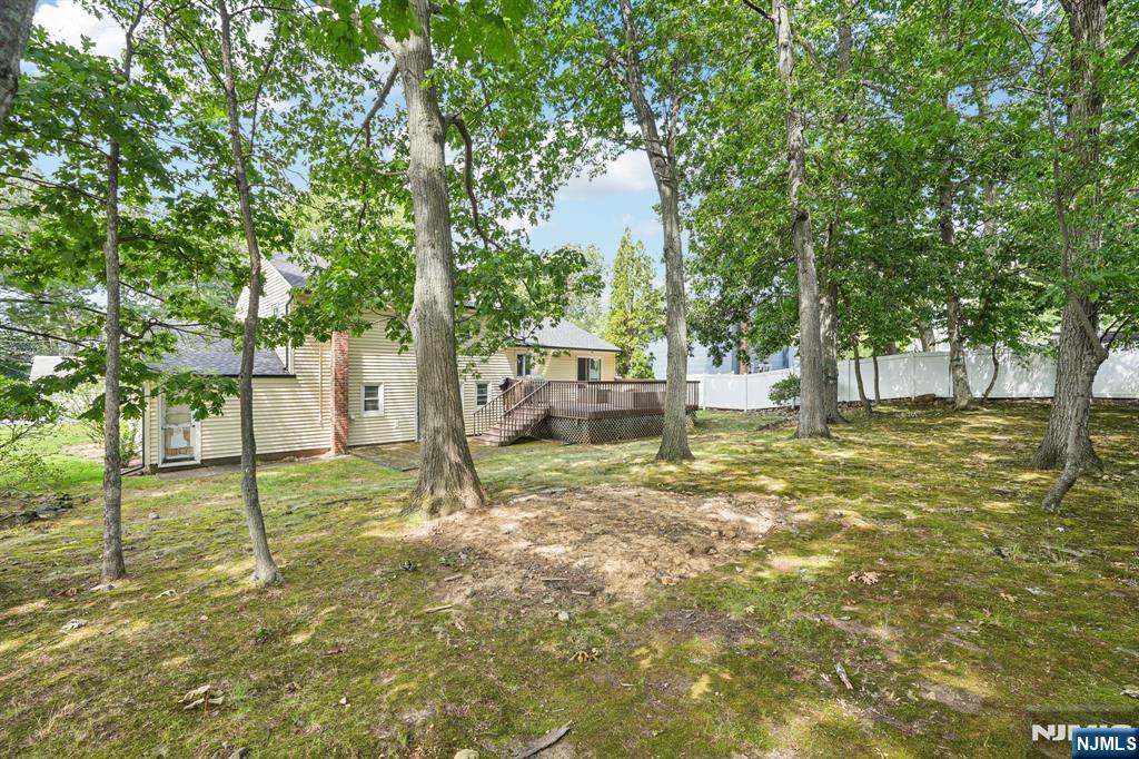 63 Crestmont Road West Orange, NJ 07052 - Photo 40 of 40 a view of a tree in the middle of a yard