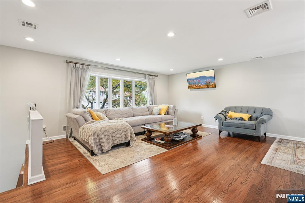 63 Crestmont Road West Orange, NJ 07052 - Photo 7 of 40 a living room with furniture and a large window