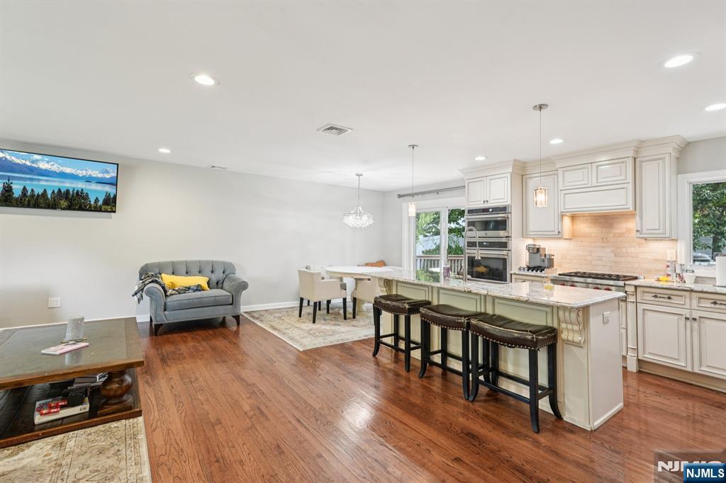 63 Crestmont Road West Orange, NJ 07052 - Photo 10 of 40 a living room with furniture and wooden floor