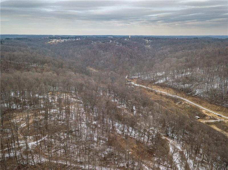 0 Neville Road Beaver, PA 15009 - Photo 6 of 13 This aerial shot is taken from Neville Road looking back thru acreage. Access is located to the right where you see the cars parked and access across the bridge.