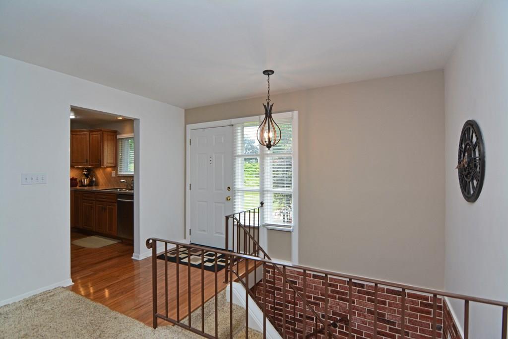 1995 O'Block Road Plum, PA 15239 - Photo 2 of 20 The hardwood entry greets your guests and leads to an open, neutral-toned floor plan.