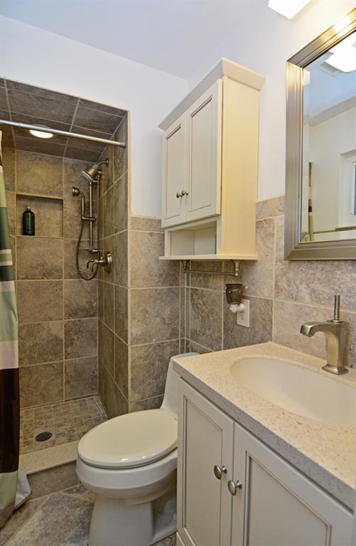 1995 O'Block Road Plum, PA 15239 - Photo 11 of 20 The renovated en suite master bath boasts fine tile work, new fixtures and a walk-in shower.