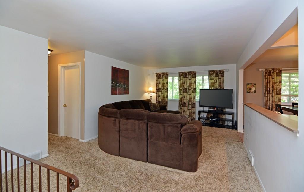 1995 O'Block Road Plum, PA 15239 - Photo 7 of 20 Warm and inviting, the neutral-colored living room is perfect for relaxing and watching television.