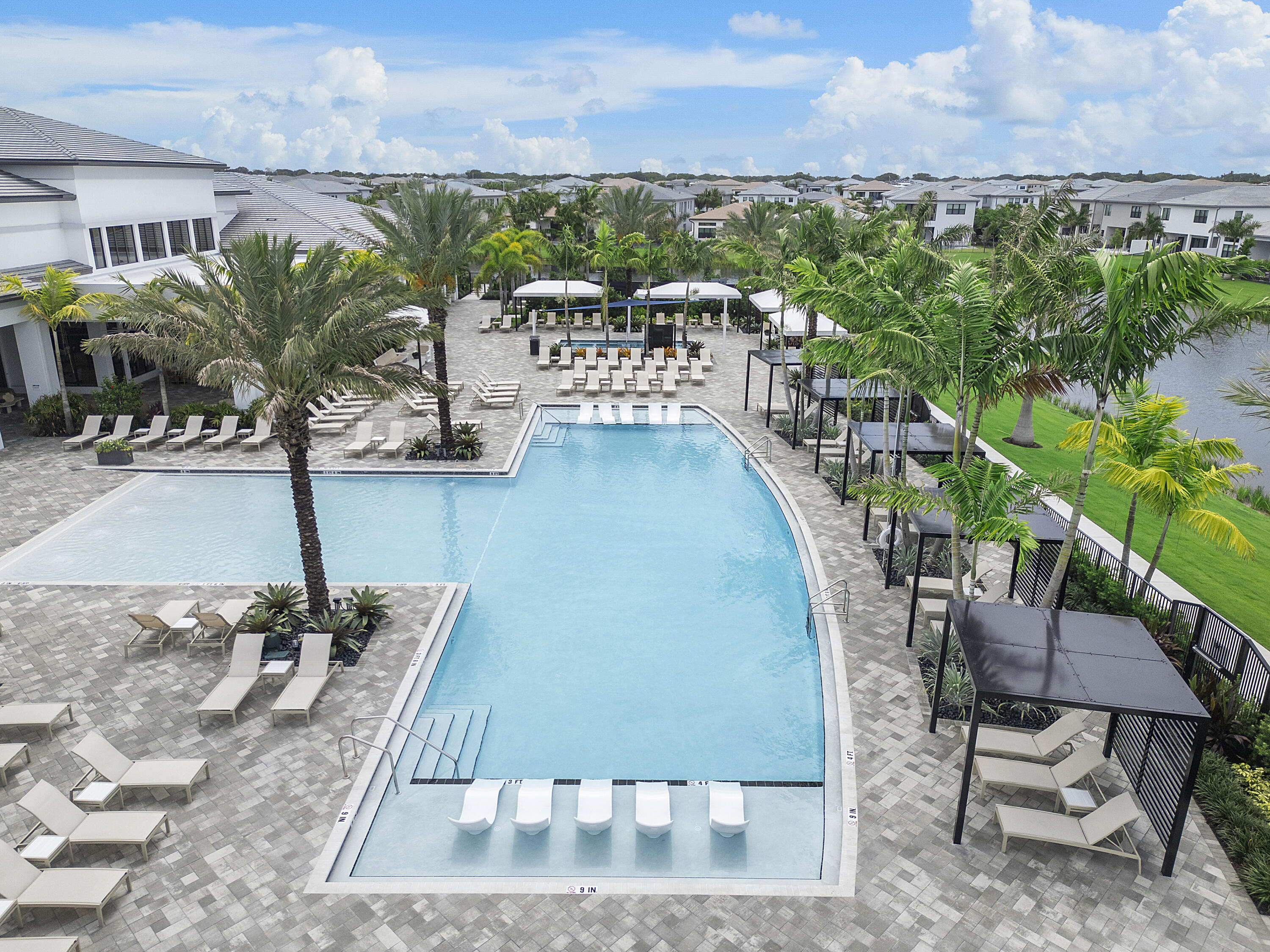 9322 Sunflower Mdw Road Boca Raton, FL 33434 - Photo 81 of 87 a view of a balcony with chairs
