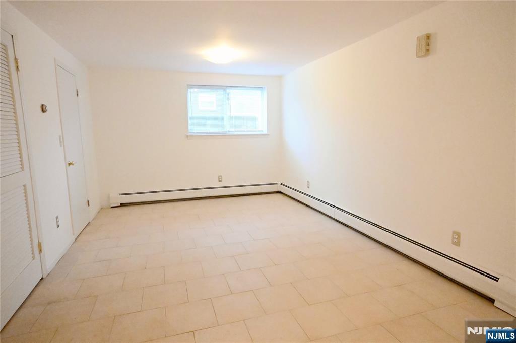 436 Brinkerhoff Avenue, Unit RIGHT Fort Lee, NJ 07024 - Photo 9 of 10 a view of an empty room