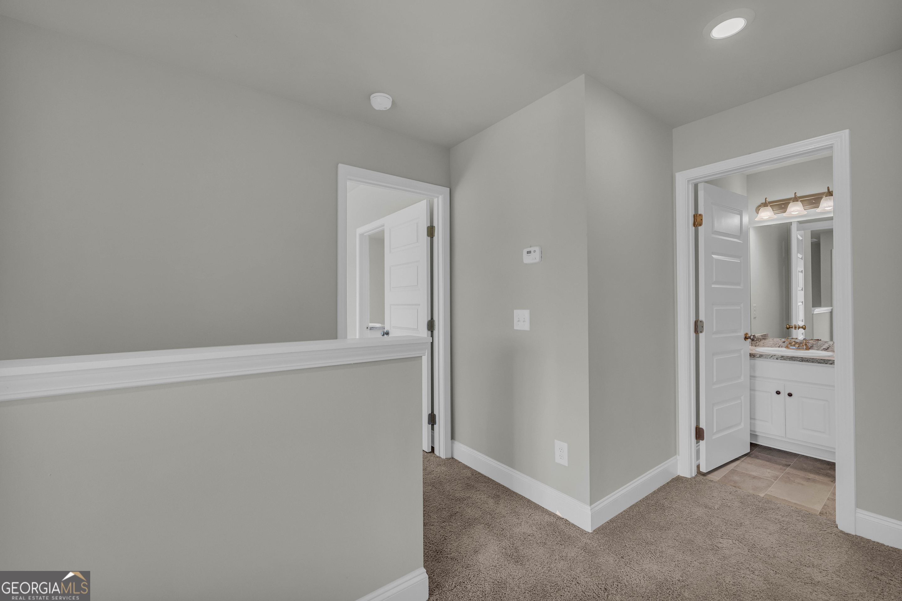 62 Sewell Road Lavonia, GA 30553 - Photo 27 of 63 an empty room with mirror