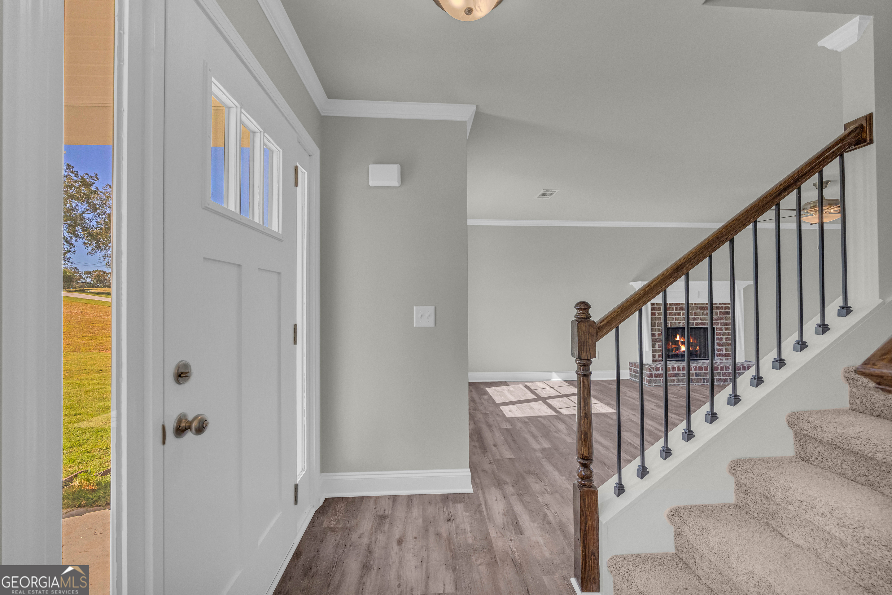 62 Sewell Road Lavonia, GA 30553 - Photo 3 of 63 a view of entryway with wooden floor and windows