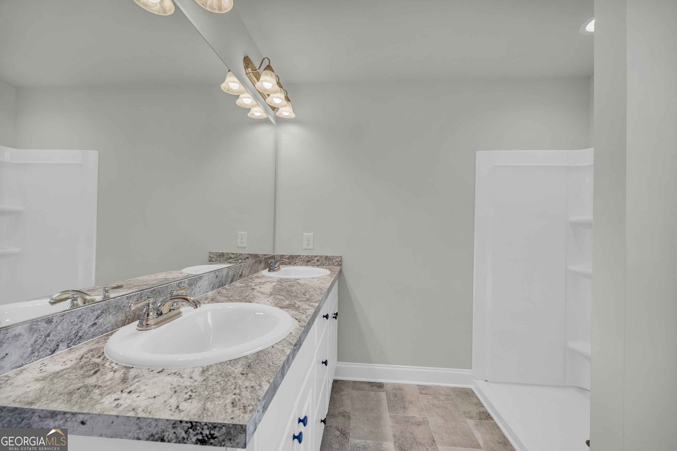 62 Sewell Road Lavonia, GA 30553 - Photo 33 of 63 a bathroom with a sink and a mirror