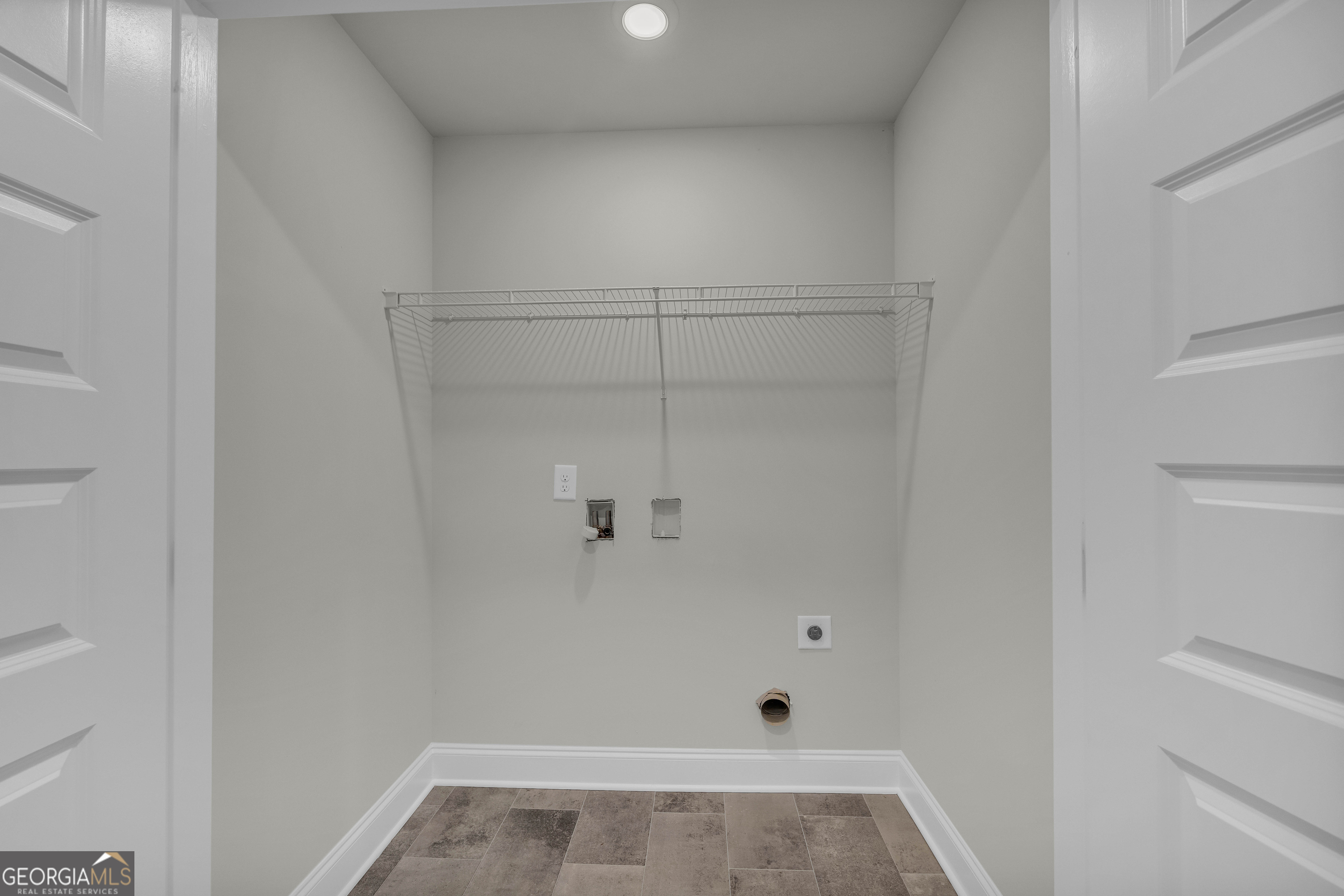 62 Sewell Road Lavonia, GA 30553 - Photo 39 of 63 a view of a room with rack on the wall