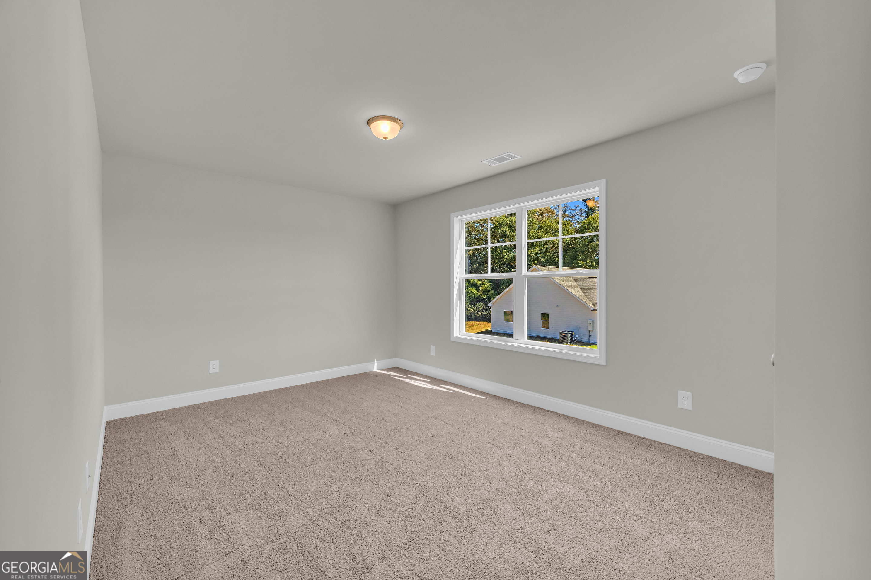 62 Sewell Road Lavonia, GA 30553 - Photo 49 of 63 an empty room with windows