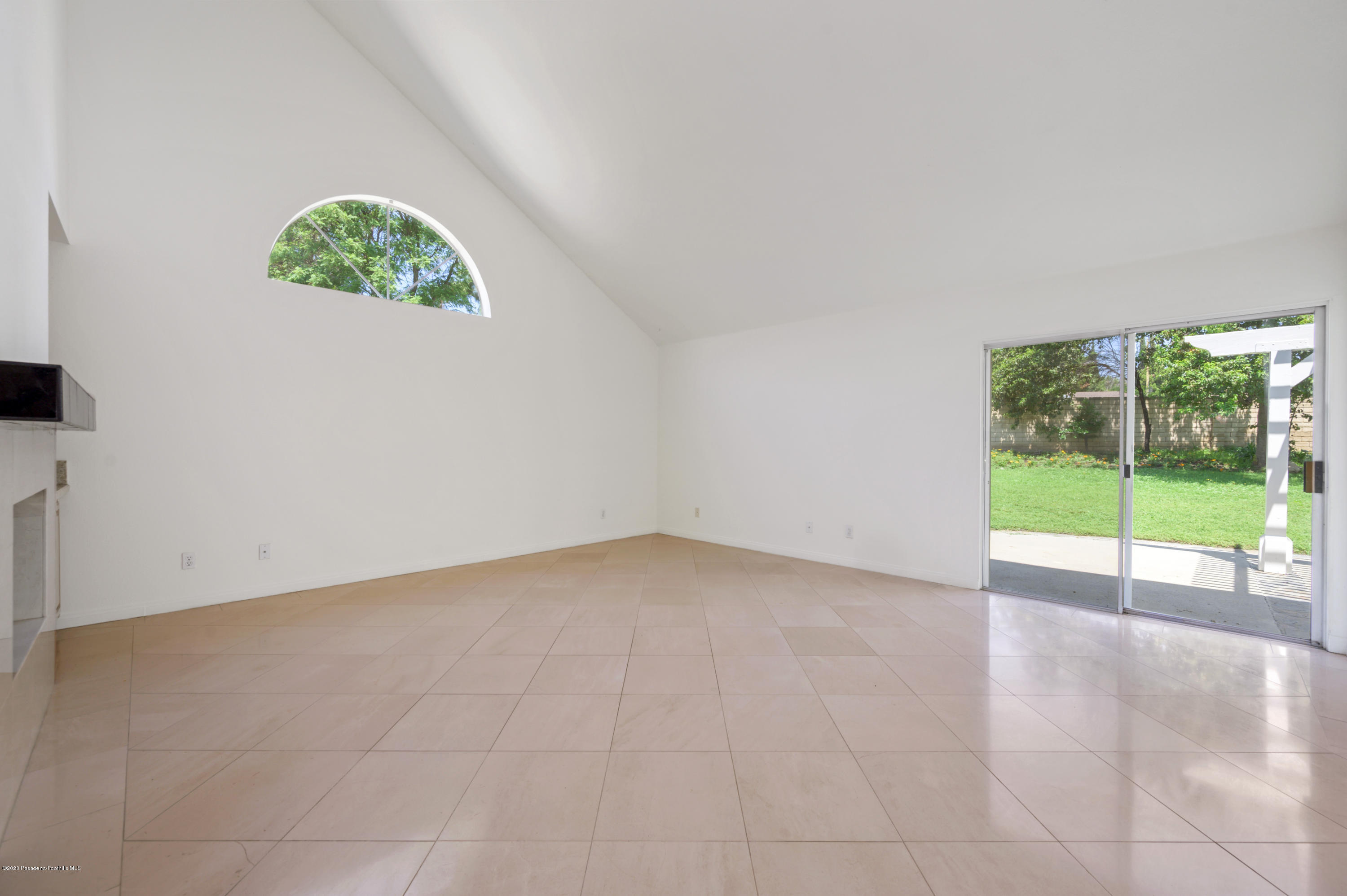 10652 Rathburn Avenue Porter Ranch, CA 91326 - Photo 13 of 61 a view of an empty room with a window