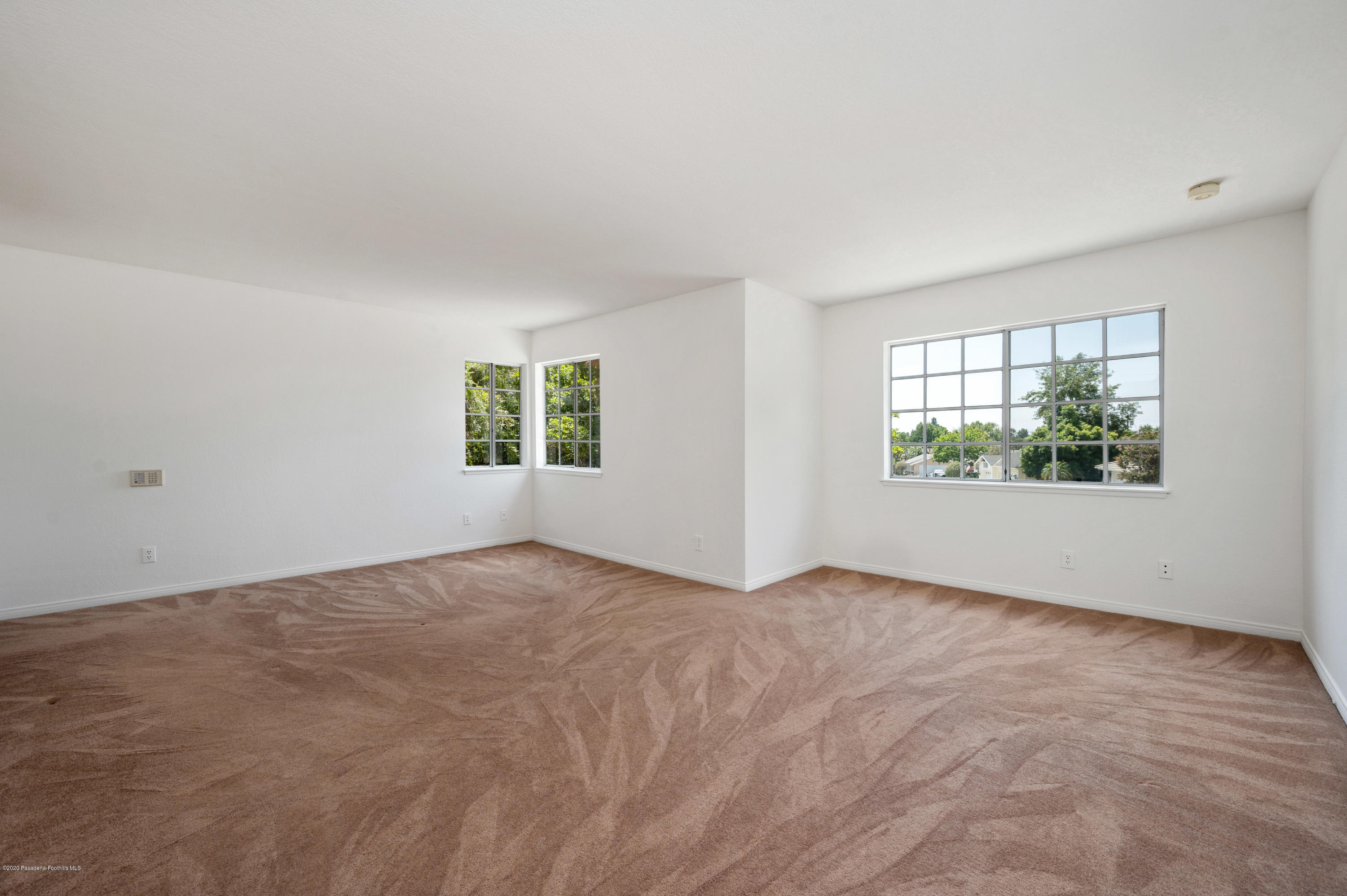 10652 Rathburn Avenue Porter Ranch, CA 91326 - Photo 25 of 61 an empty room with windows