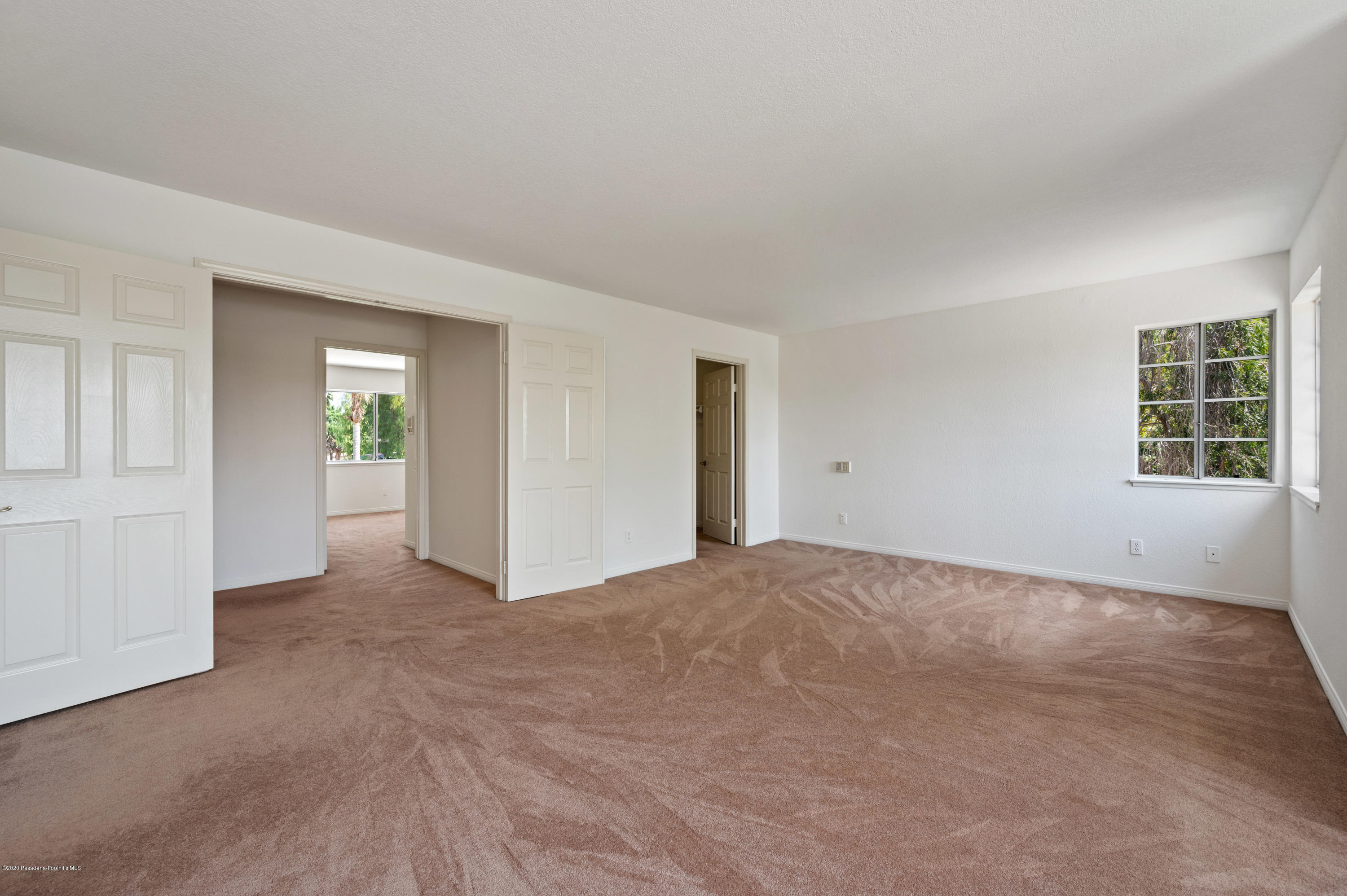 10652 Rathburn Avenue Porter Ranch, CA 91326 - Photo 26 of 61 a view of an empty room with a window