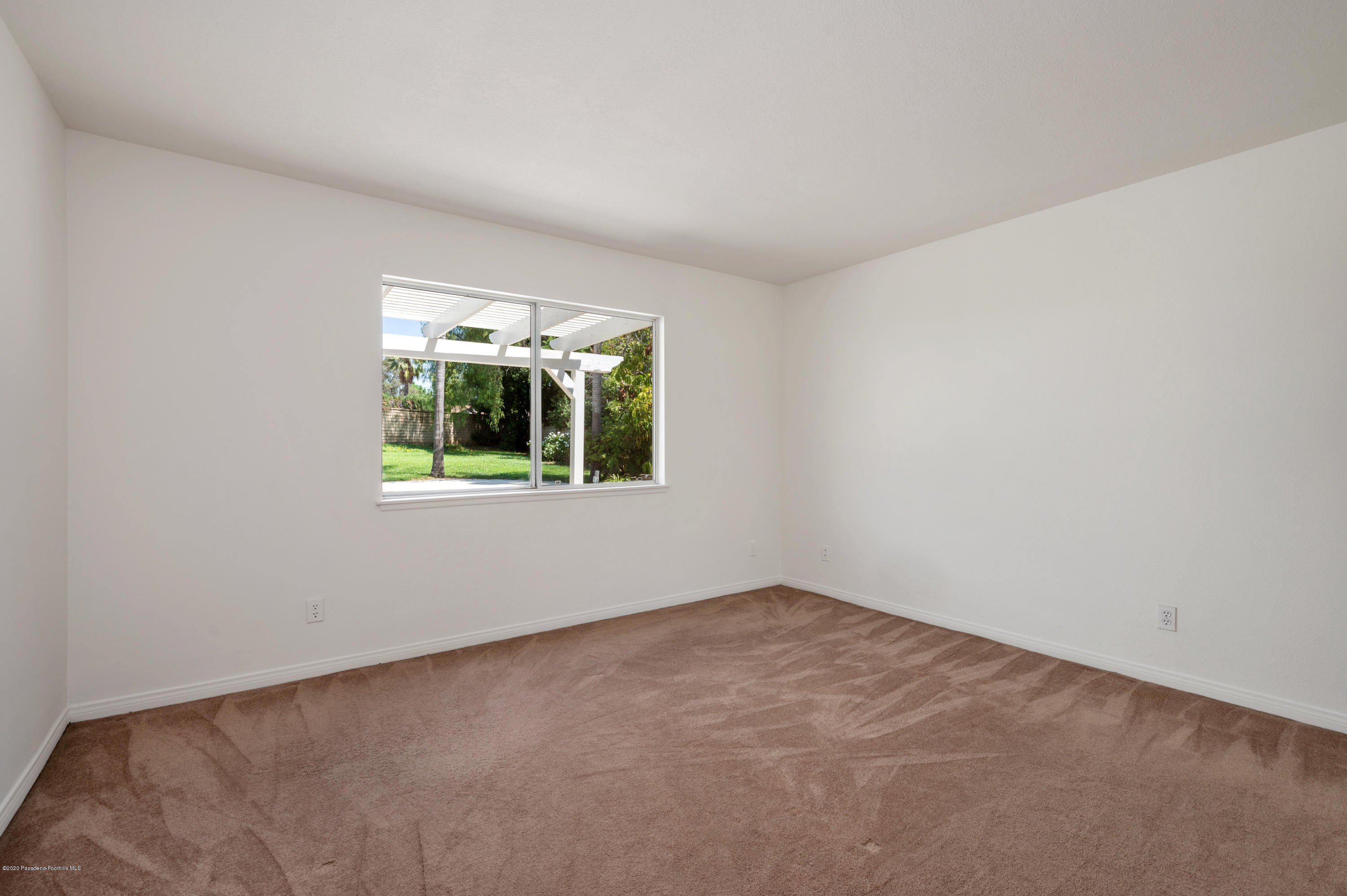 10652 Rathburn Avenue Porter Ranch, CA 91326 - Photo 37 of 61 an empty room with a window