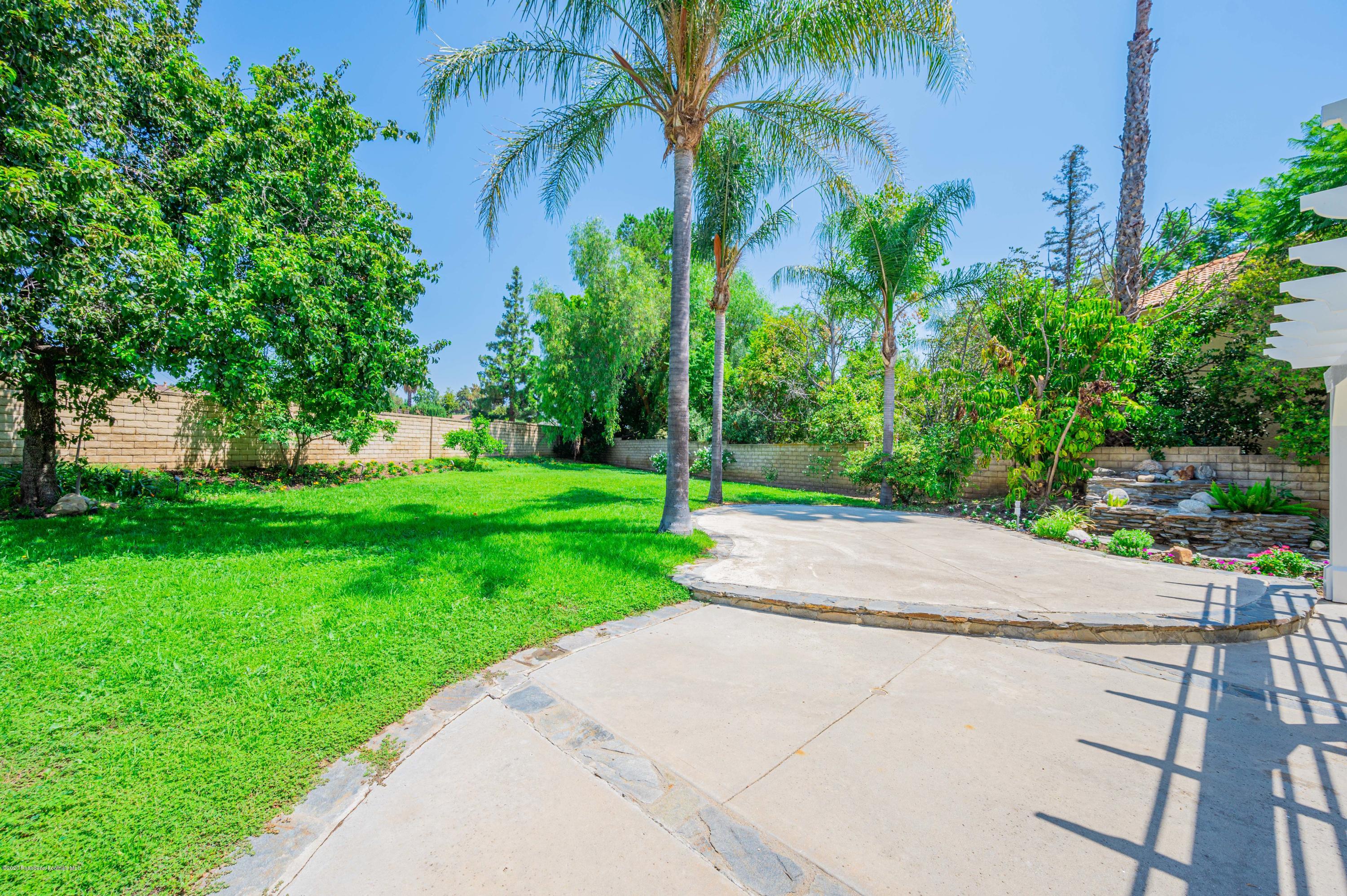 10652 Rathburn Avenue Porter Ranch, CA 91326 - Photo 47 of 61 a view of a park with palm trees